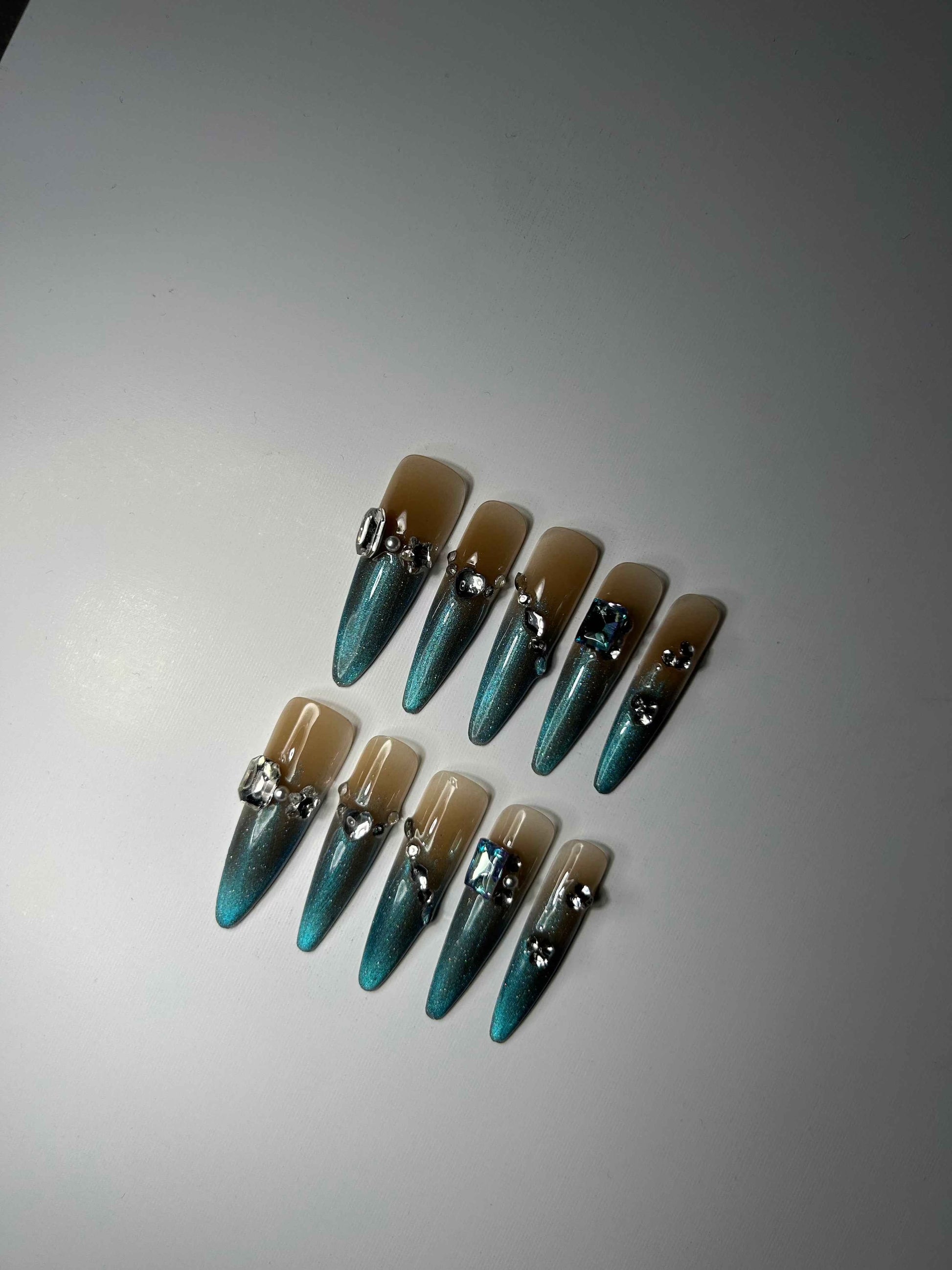 Teal Opulence Almond Nails