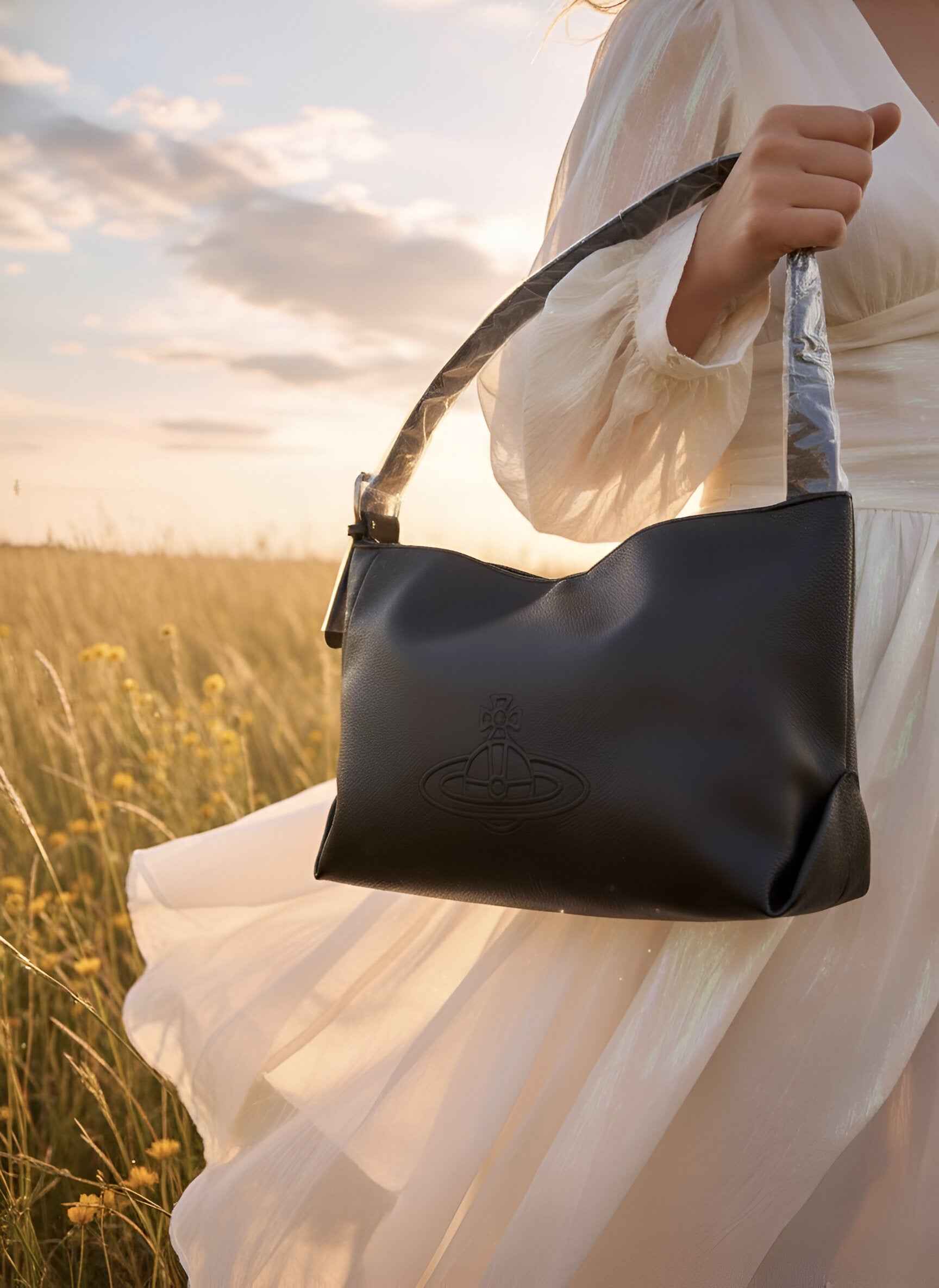 Cosmic Chic: Orb-Embossed Black Shoulder Bag 🪐